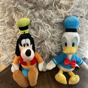 Disney Orange and Brown Stuffed Animals Goofy and Donald